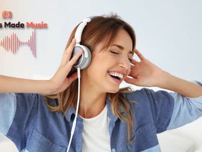 Person wearing headphones smiling while listening to music beside the Memories Made Music logo.