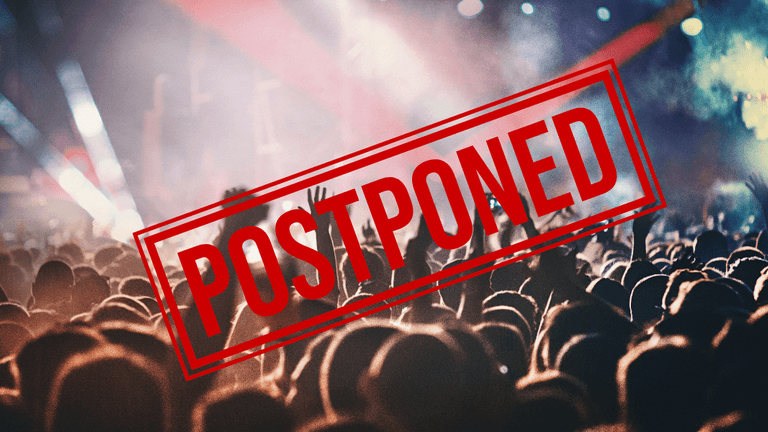 Crowd at a concert with a "POSTPONED" stamp overlaying the image