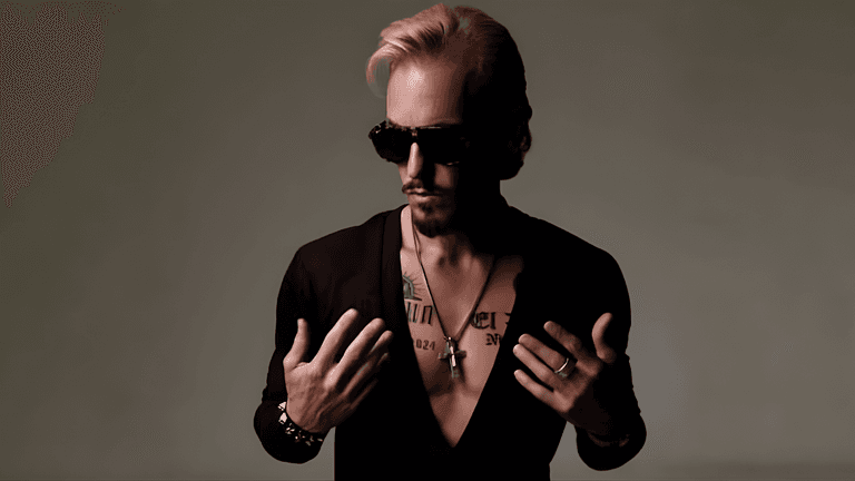 A rebellious artist, C.J. Shaman, exuding confidence with a bold, rock-inspired look, embodying freedom and raw energy.