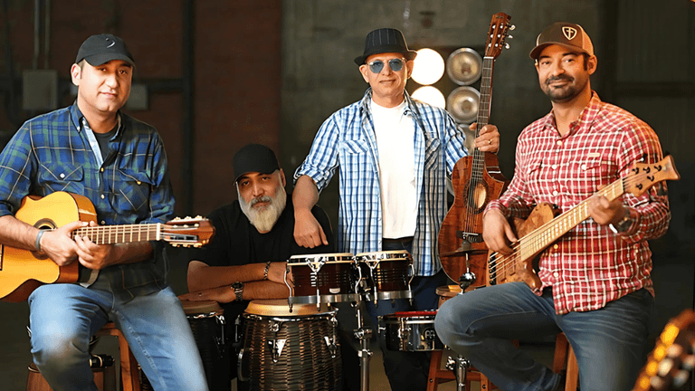 Farsi Praise Club band members with instruments, celebrating faith and music, promoting their new single 'Mojezeh' about miracles.