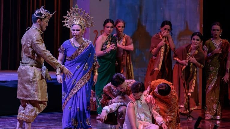 Actors performing in a scene from The Silent Prince, an opera blending Eastern culture and Western operatic tradition.
