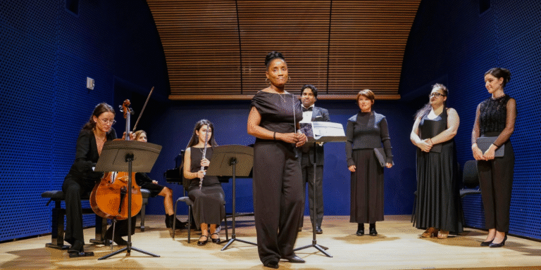 Kervy Delcy leads a performance with her ensemble, inspiring the next generation of musicians through her performing arts school and mentorship.