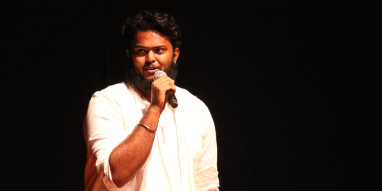 Thivan Sreetharan, a rising star in acting and music, passionately speaks at an event, showcasing his dedication to success.