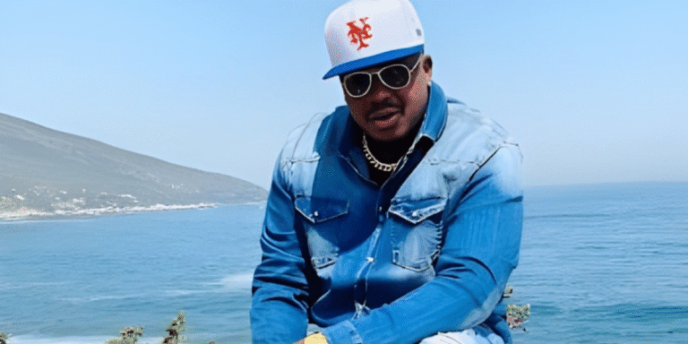 The Afropolitan Revolution of Freddy Will: Literature, Music, & Philanthropy Freddy Will, artist and author, confidently poses by the ocean, symbolizing his blend of creativity, philanthropy, and Afropolitan culture.