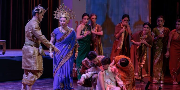 Actors performing in a scene from The Silent Prince, an opera blending Eastern culture and Western operatic tradition.